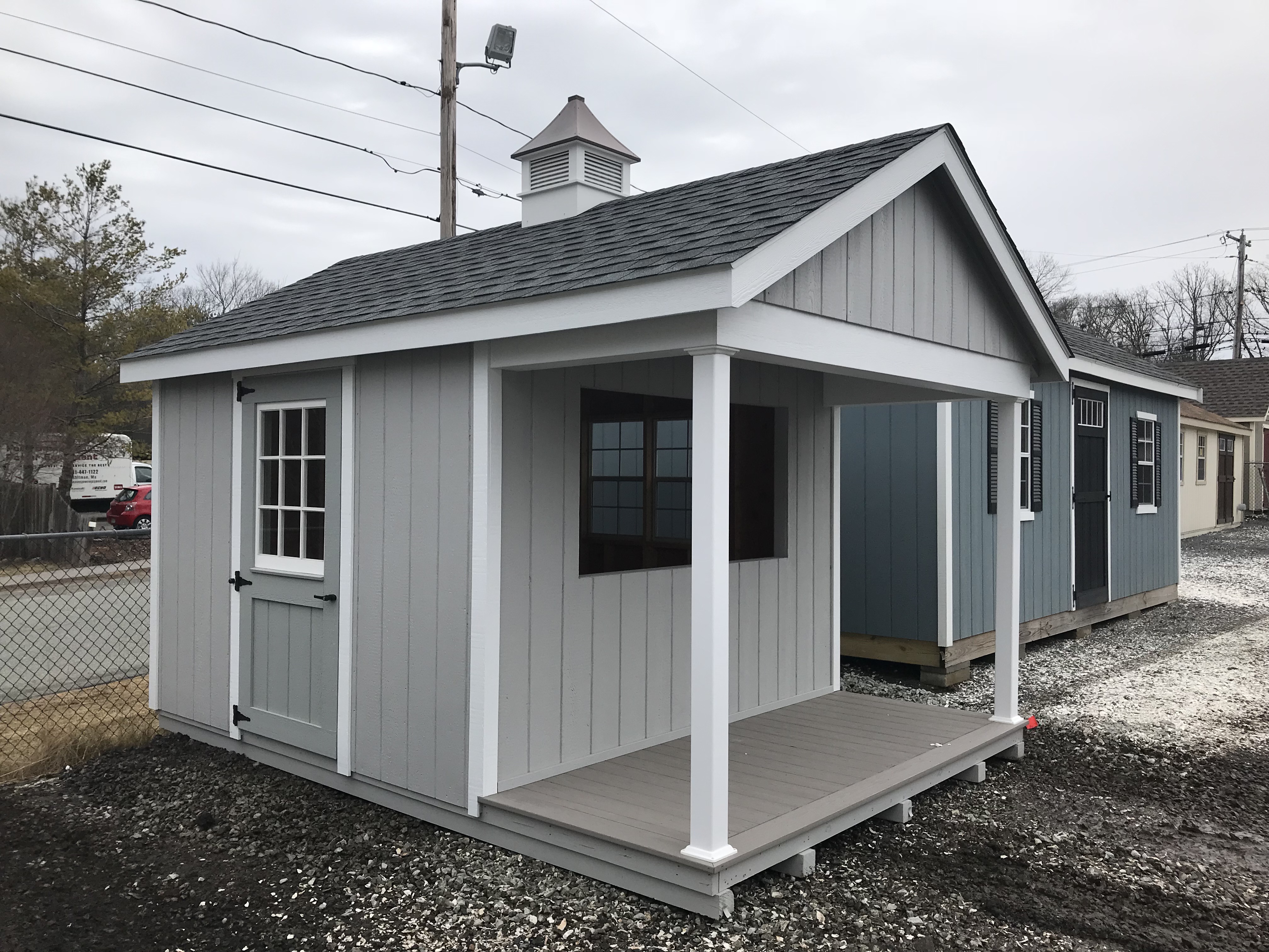 C8 - 10X14 Classic Cape shown in Duratemp Siding with Optional Gable Porch Option