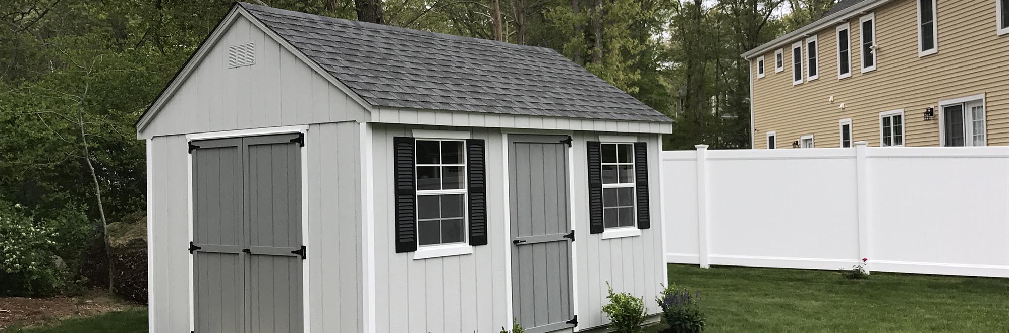 Grey Shed with Black Accents