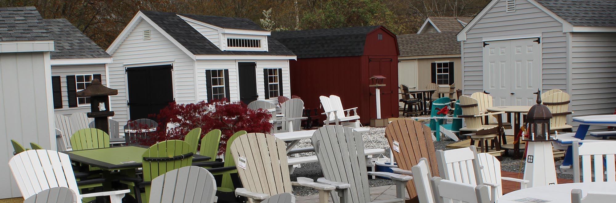 Adirondack chairs and Sheds in Background